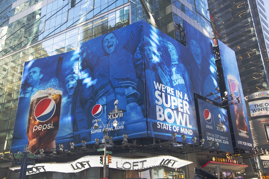 NEW YORK - JANUARY 30 Pepsi Official Soft Drink of Super Bowl XLVIII billboard on Broadway during Super Bowl XLVIII week in Manhattan on January 30, 2014 PepsiCo is a Super Bowl XLVIII sponsor